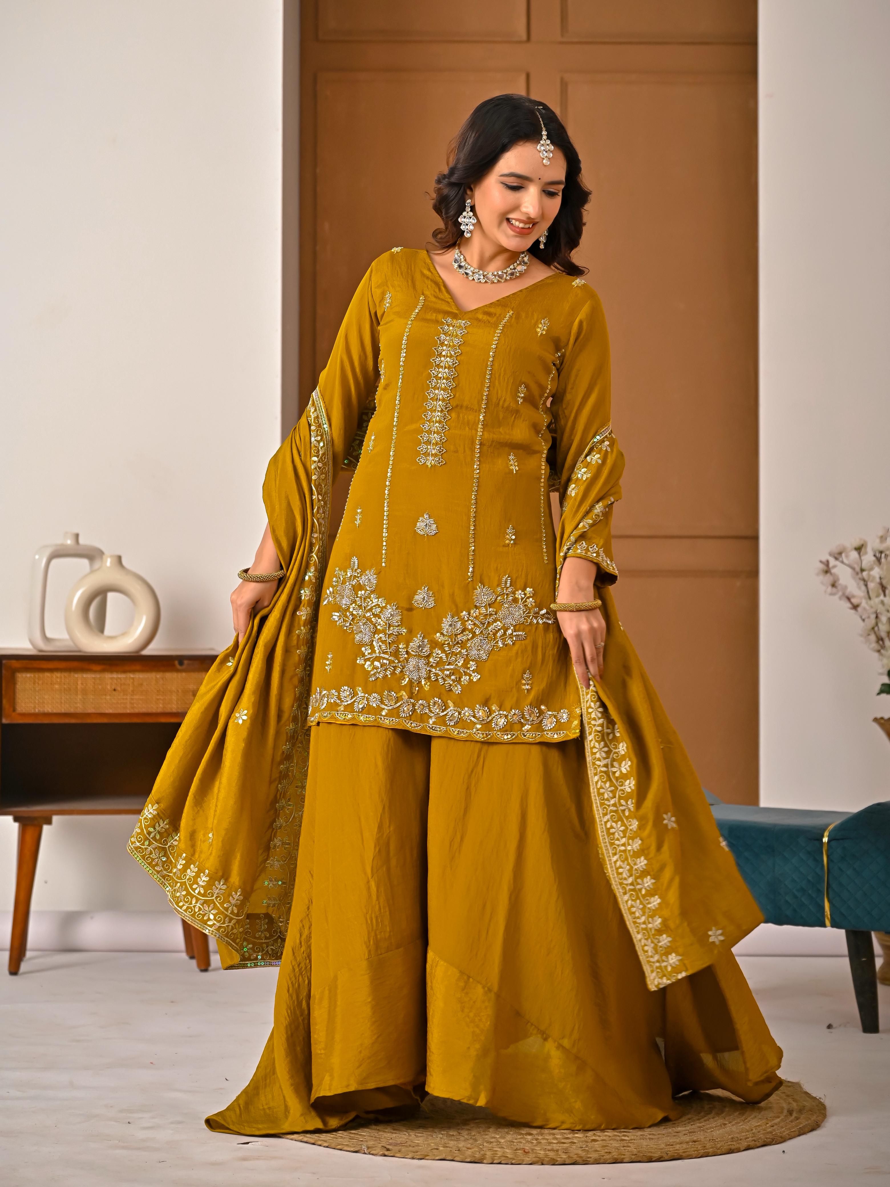 SW198 Mustard yellow NC vichitra top close-up hand work embroidery flat lay