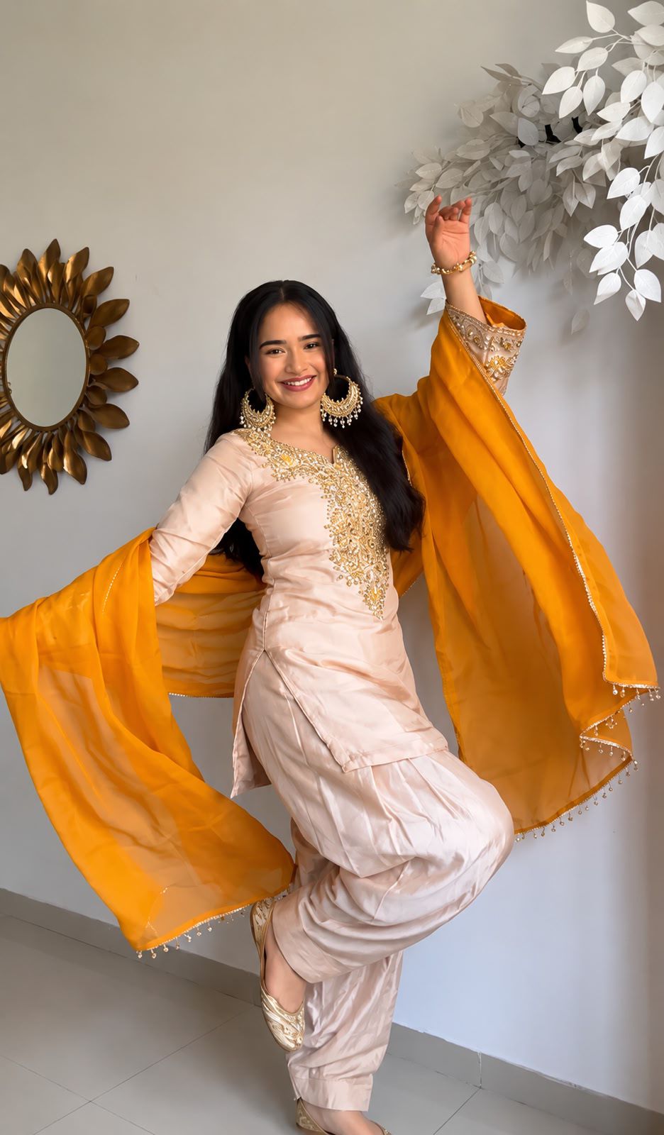 Peach salwar suit set flat lay with mustard dupatta