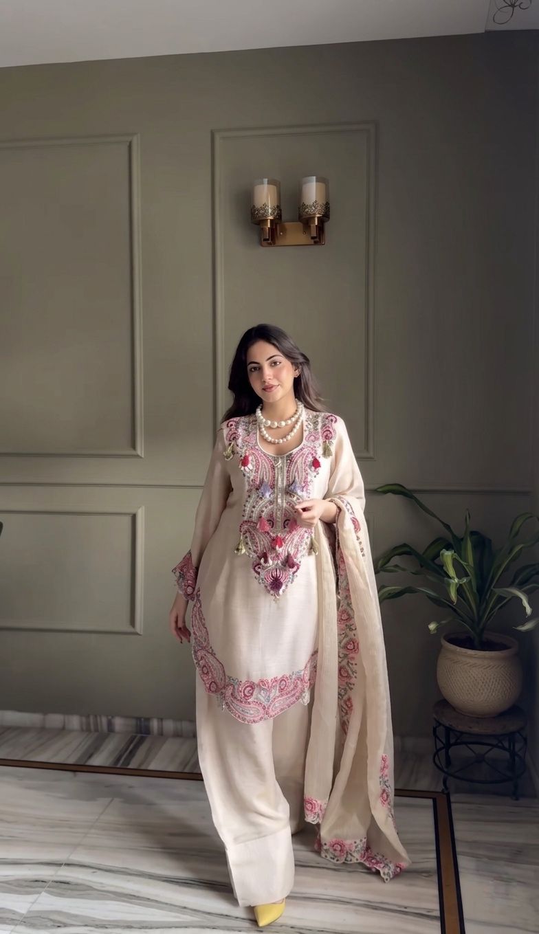Model wearing cream georgette suit with dupatta
