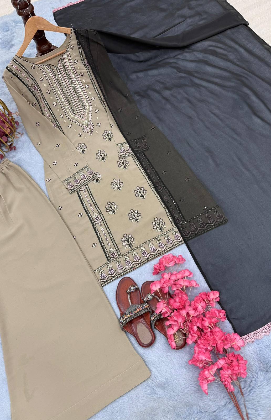 Flat lay of beige embroidered kurta with charcoal dupatta showing lace border