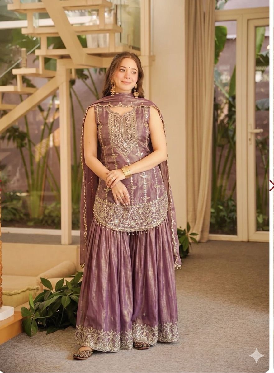 Model wearing mauve fendi silk sequin embroidered suit set with dupatta