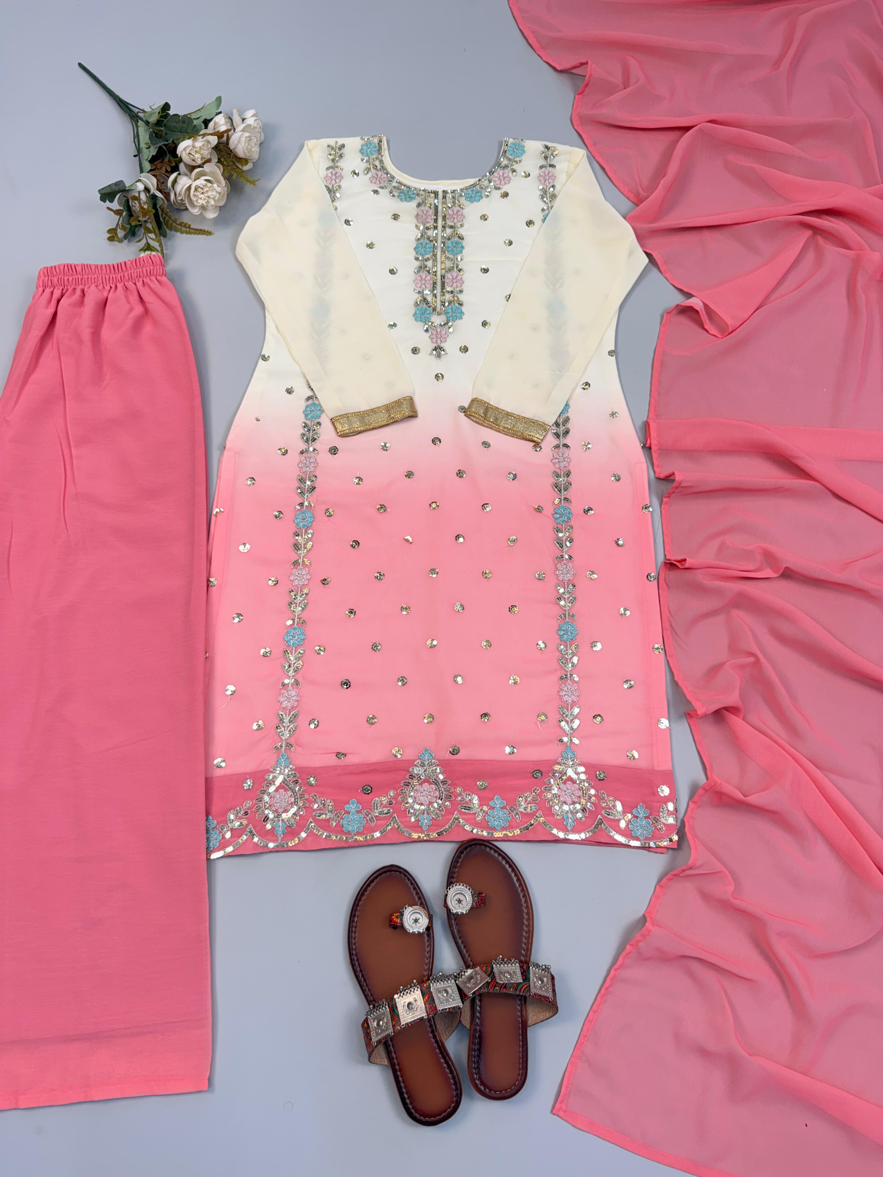 Flat lay of lavender ombre faux georgette embroidery sequence suit set with dupatta and pant