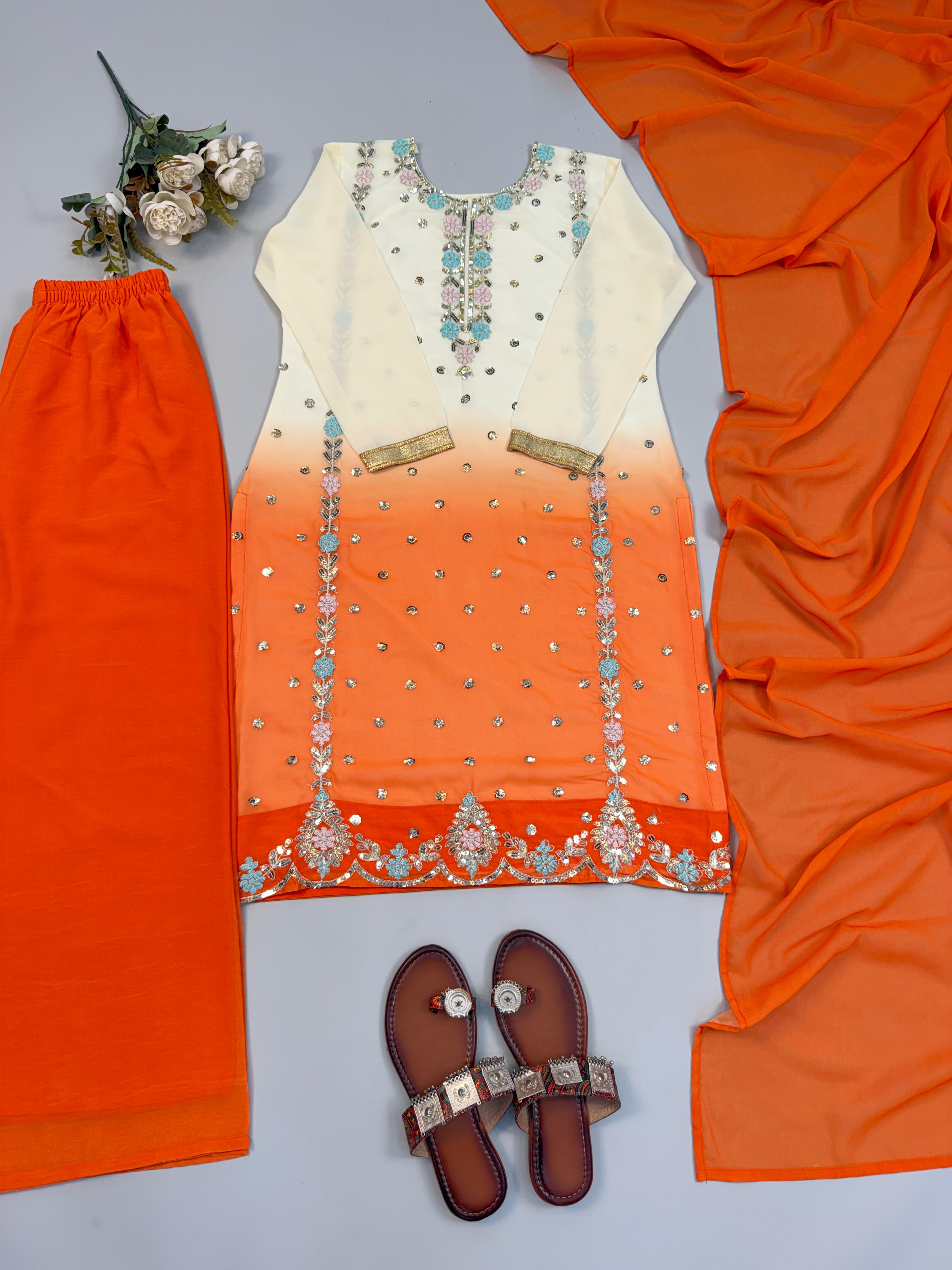 Flat lay of lavender ombre embroidered kurta showing full sequence work and floral hem border