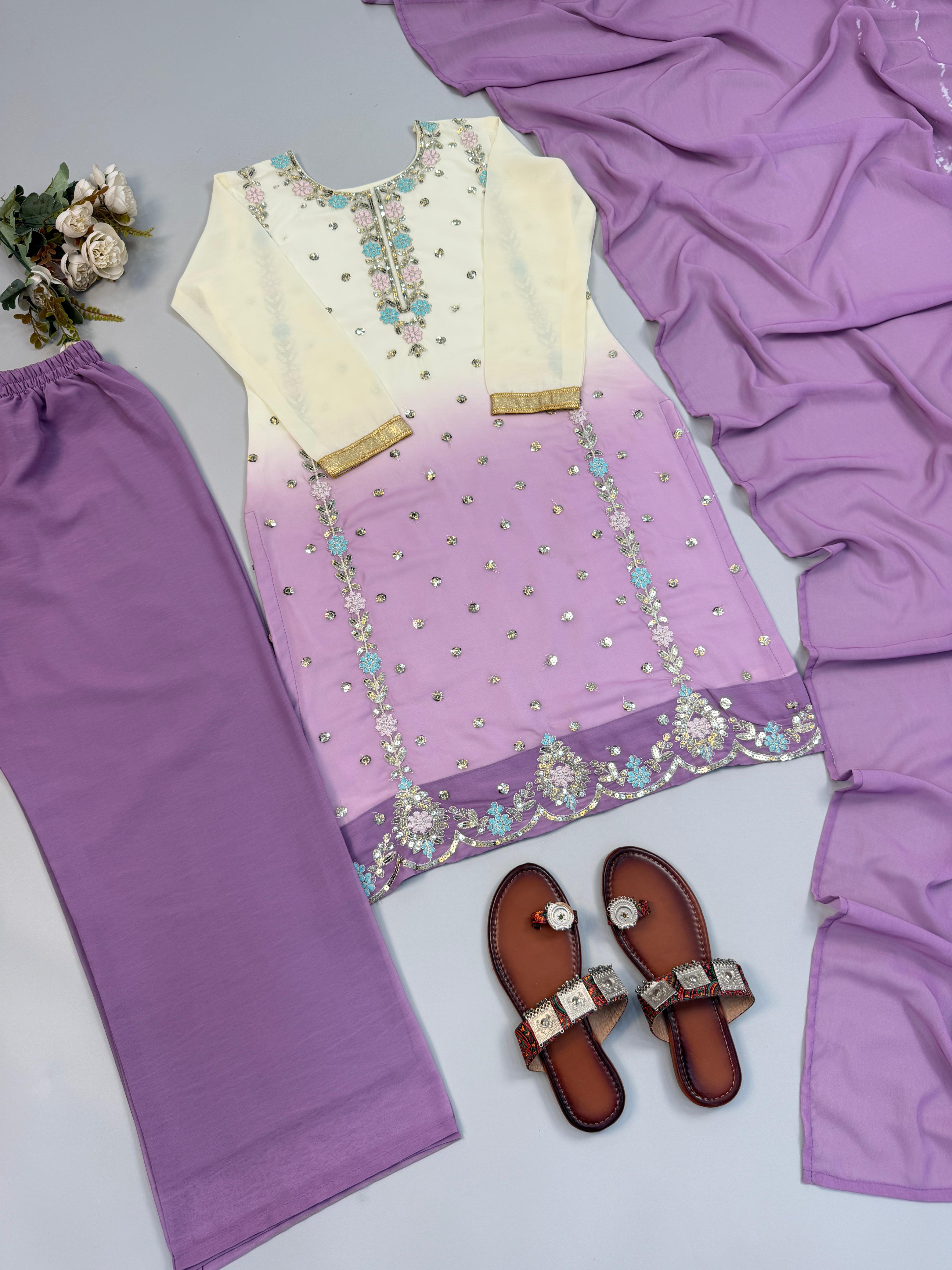 Model wearing pink ombre suit set full length view with dupatta draped