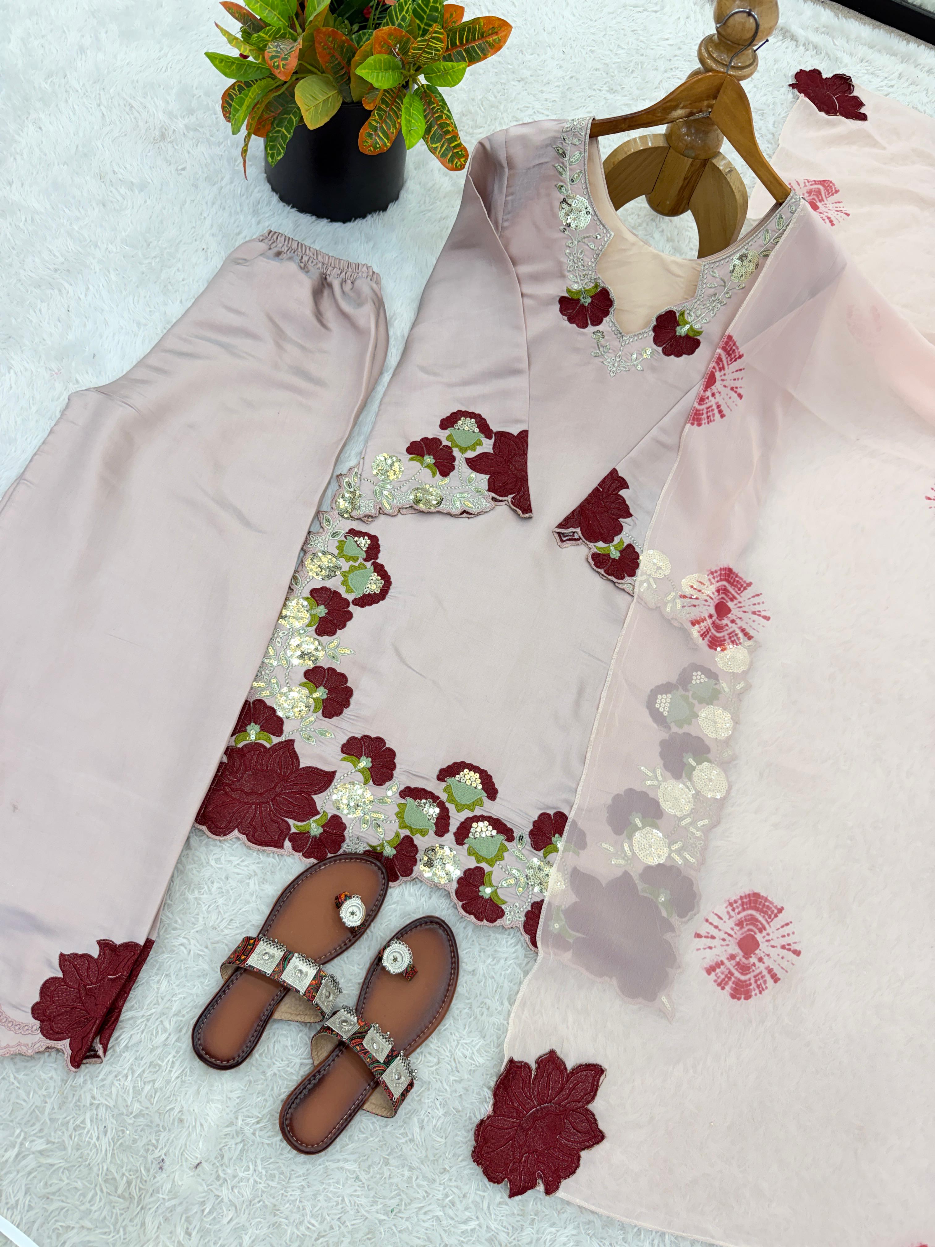 Flat lay of blush pink roman glass kurta showing complete embroidery and floral applique pattern