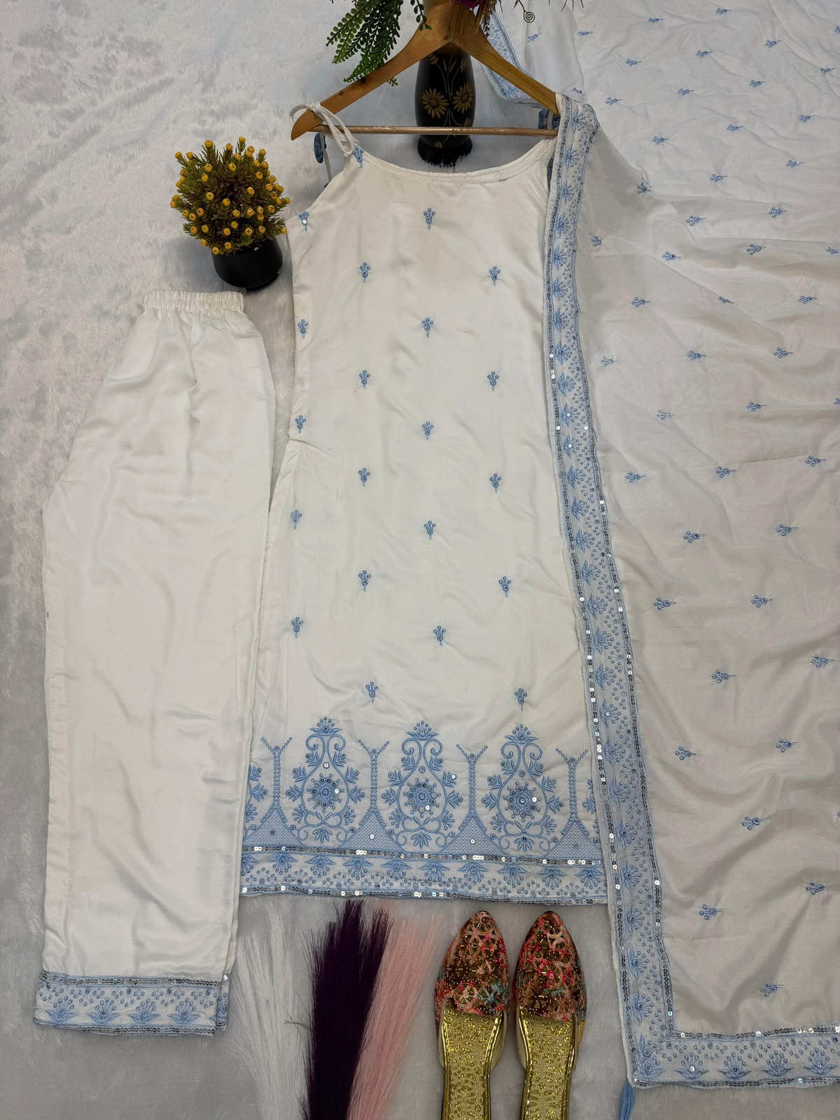 White Suit - Flat Lay with Blue Floral Work