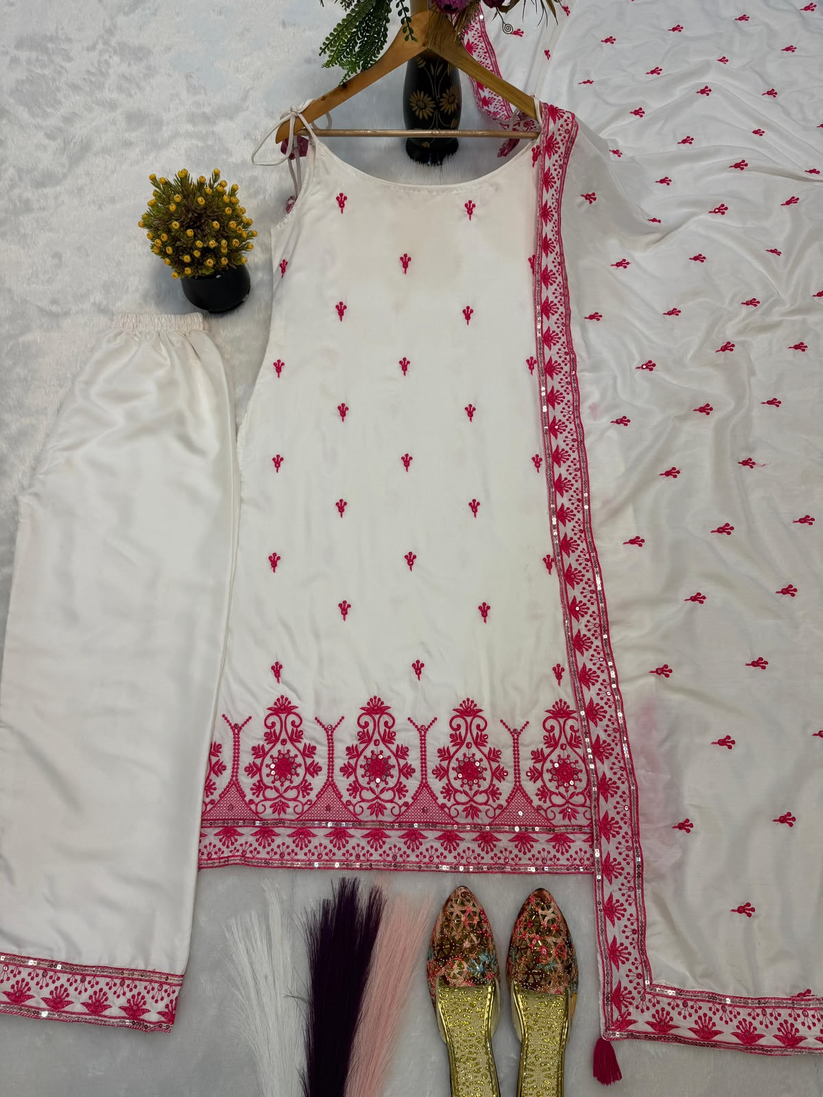 White Suit - Model Wearing Black Embroidery Variant Left