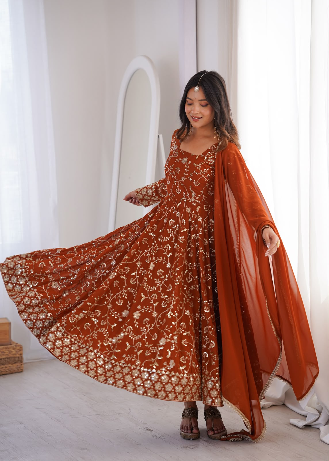 Rust Orange Anarkali Set - Model Twirling Front View