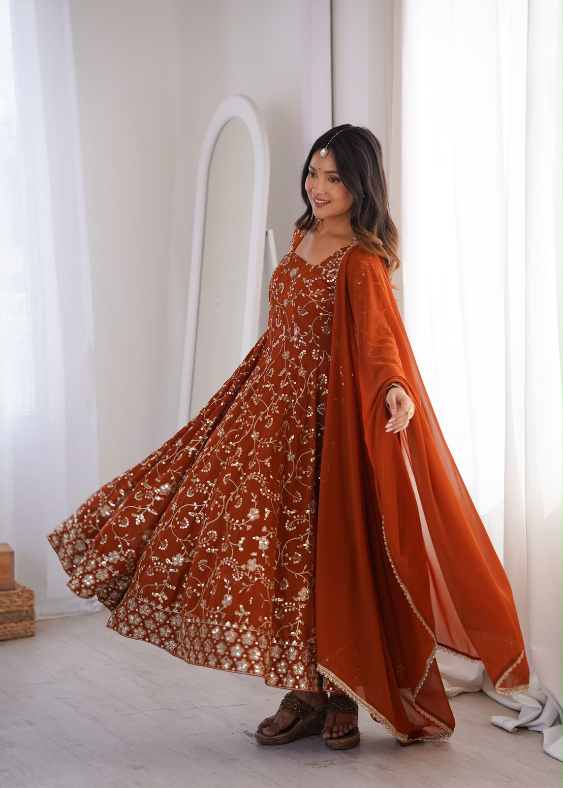 Rust Orange Anarkali Set - Model Wearing Graceful Pose