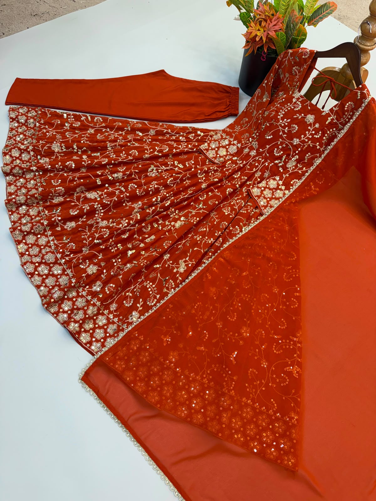 Rust Orange Anarkali Set - Flat Lay Gown on Hanger with Bottom