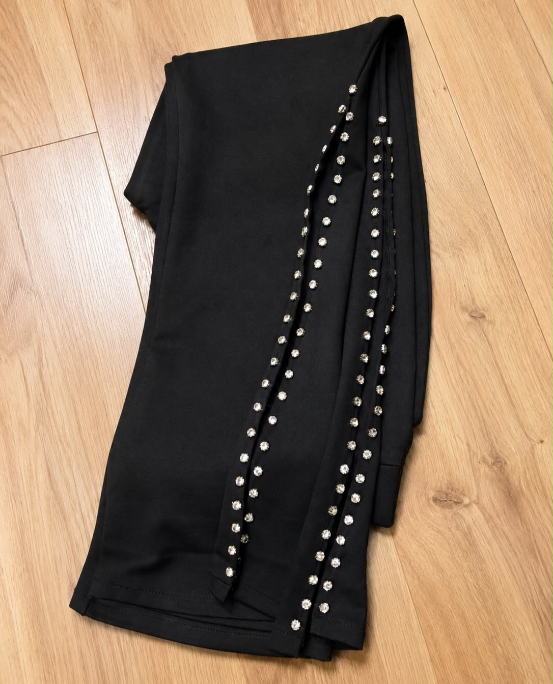 Premium Side Stone Flared Black Trouser - folded flat lay