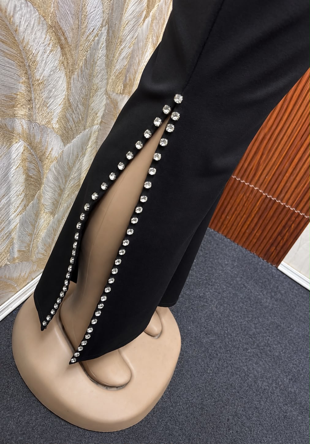 Premium Side Stone Flared Black Trouser - close up stone slit detail
