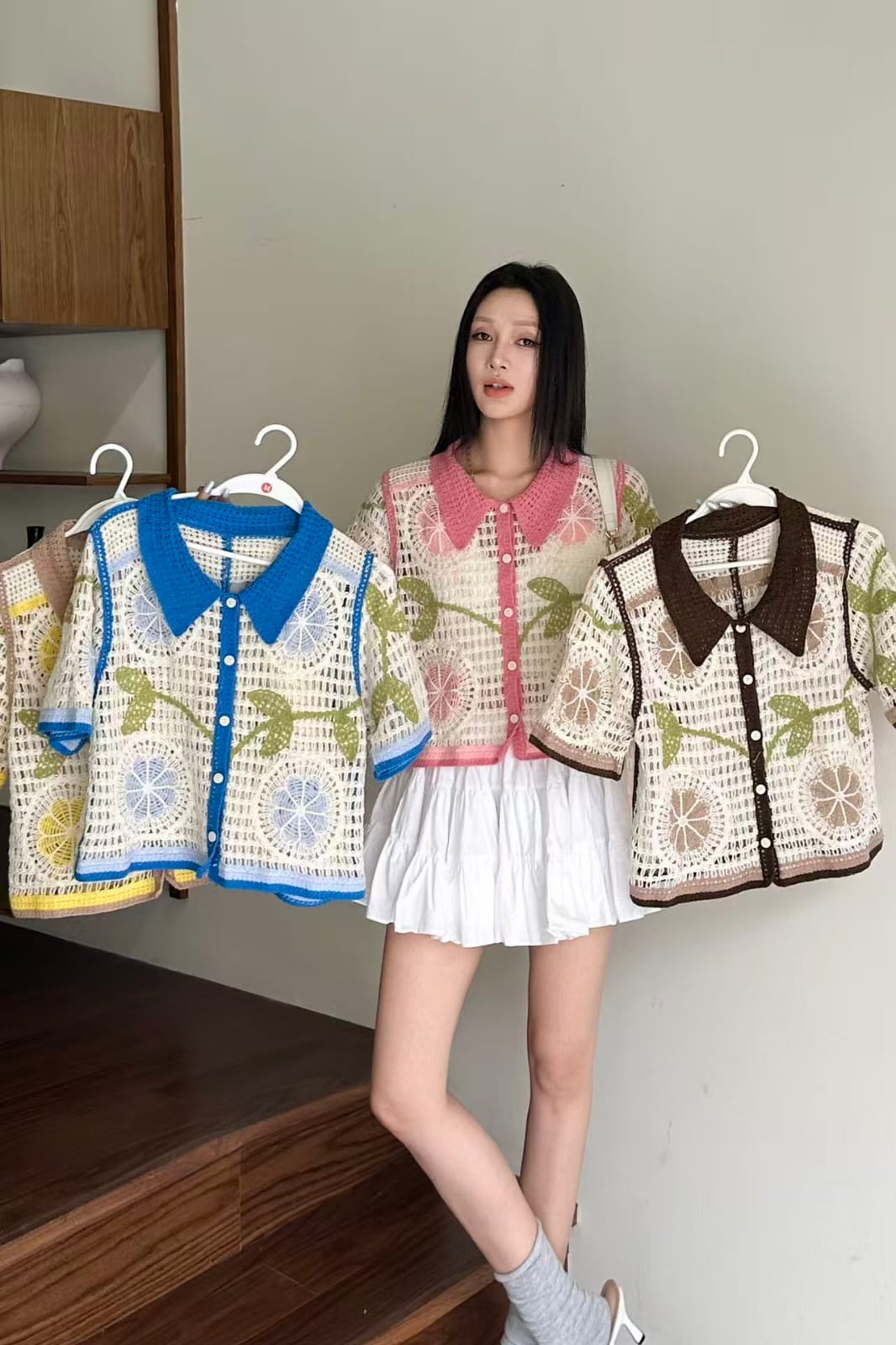 Beautiful Crochet Top - cream floral crochet model holding blue and brown variants