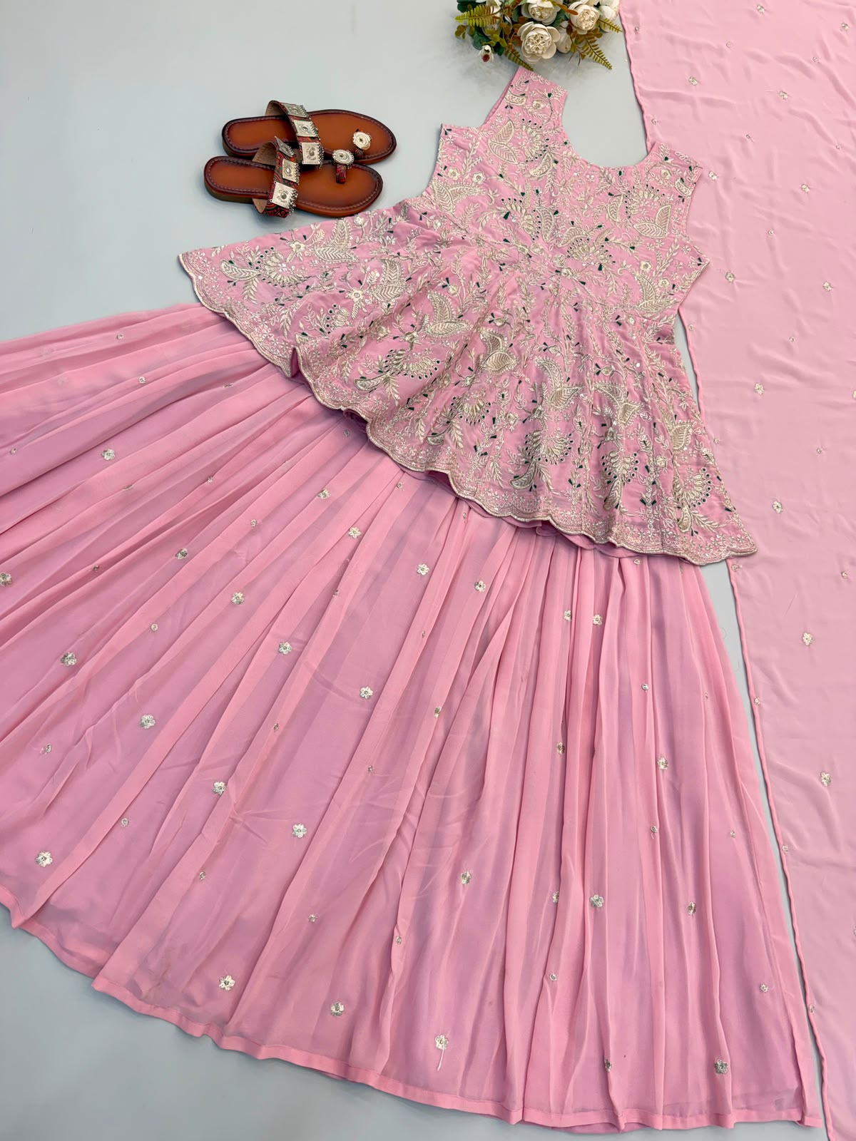 Rose pink peplum top and lehenga flat lay - full spread