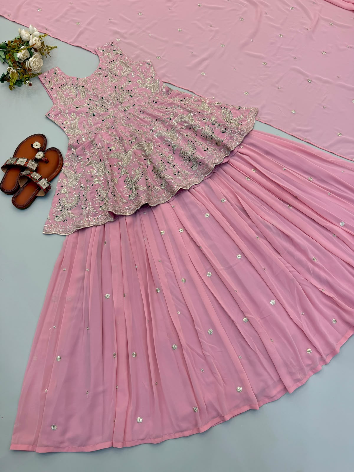 Rose pink lehenga and dupatta flat lay detail