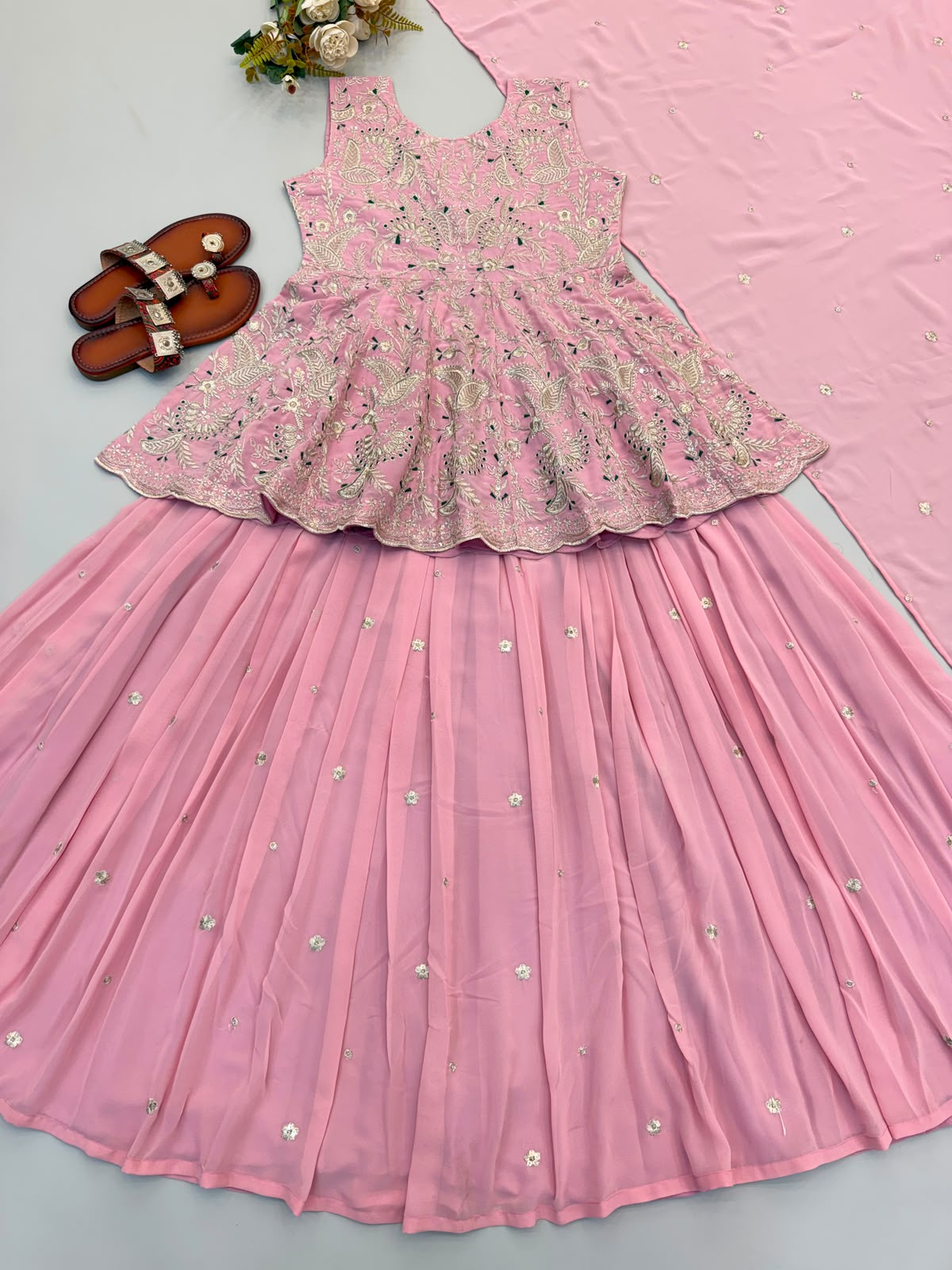 Rose pink peplum top close up embroidery detail