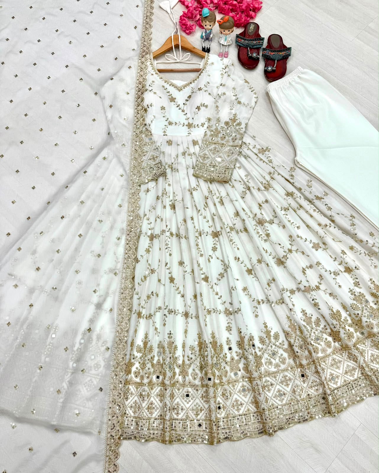 Red anarkali gown flat lay with bottom and dupatta - close up top