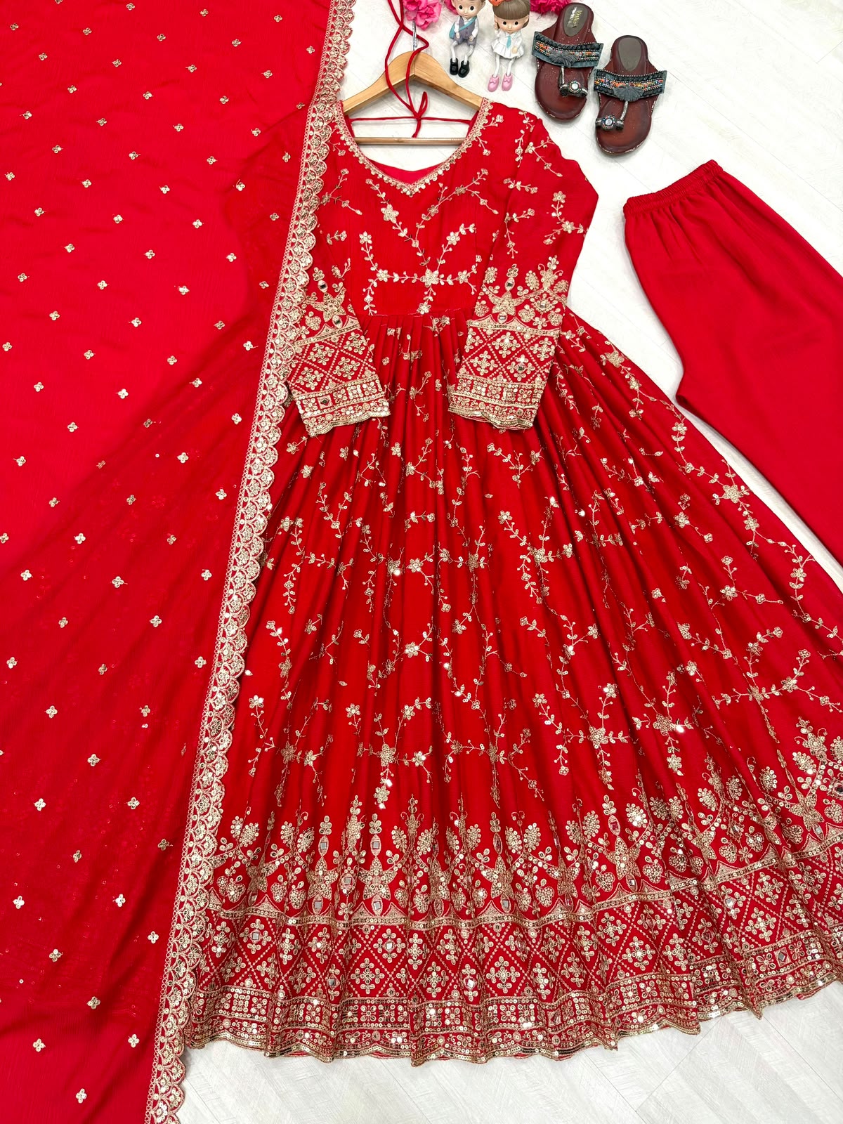 Red anarkali gown - model back view in boutique