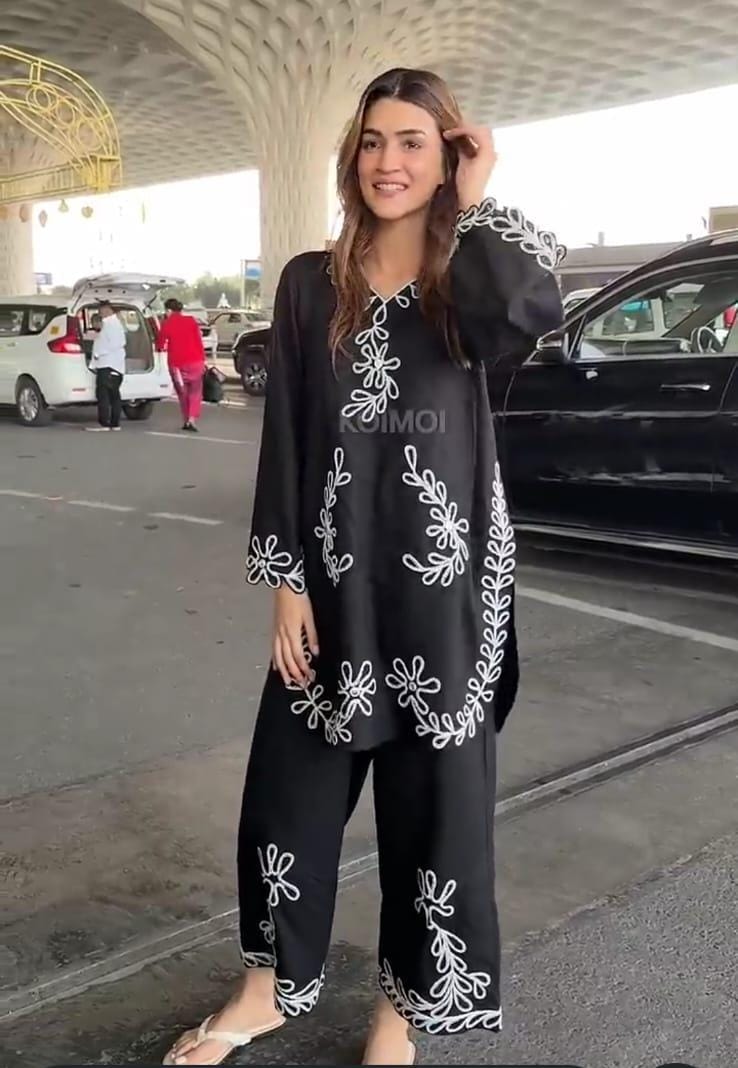 Premium Embroidered Co-ord Set - Model Wearing Black at Airport Bollywood Style