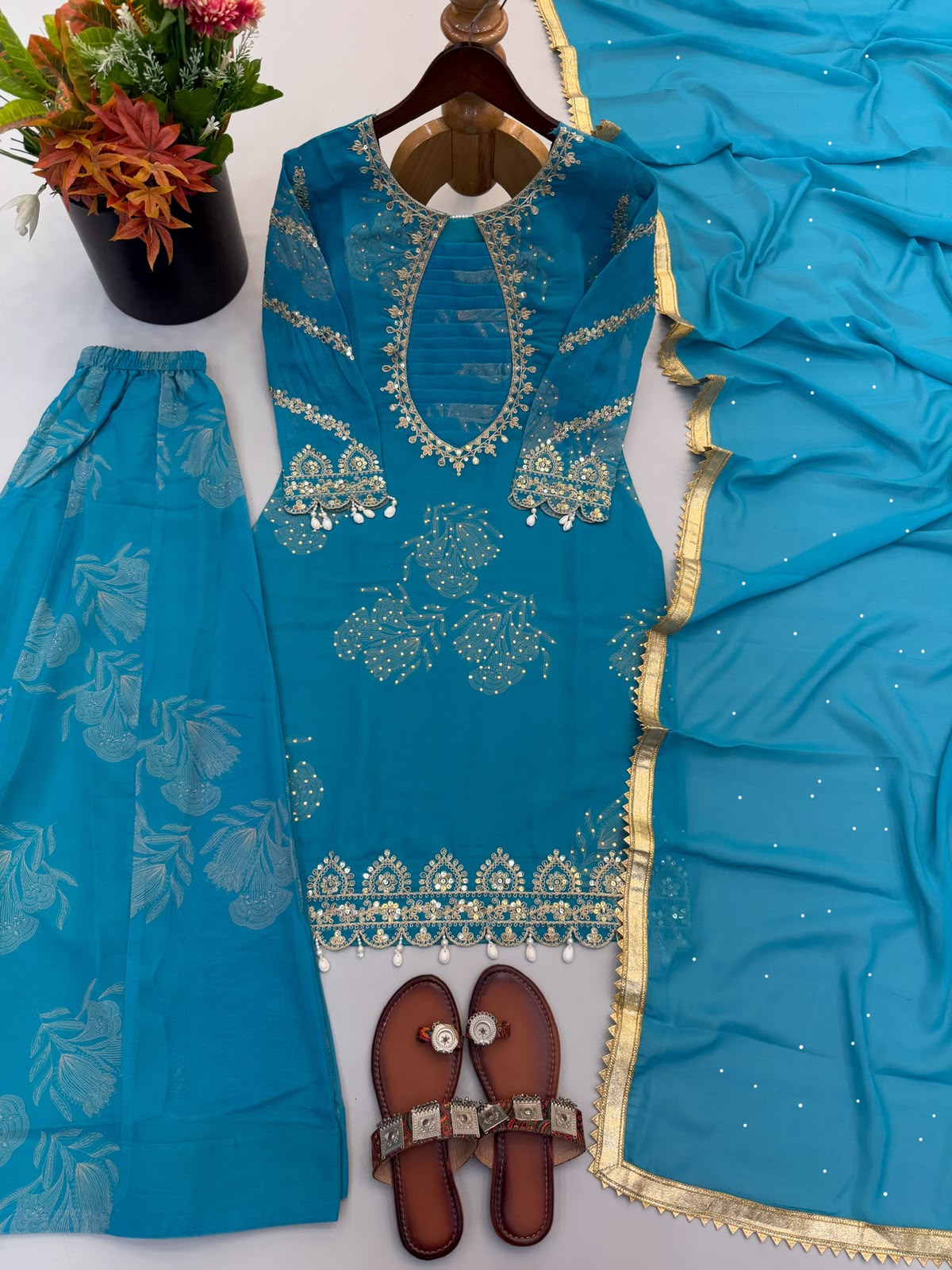 Teal faux georgette embroidery suit set - kurti neckline and embroidery detail