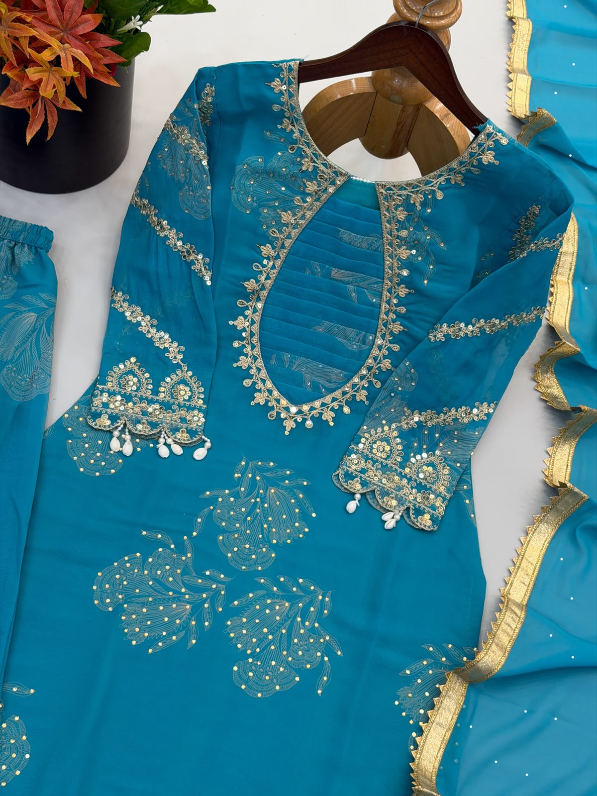 Teal faux georgette embroidery suit set - neckline and yoke embroidery detail