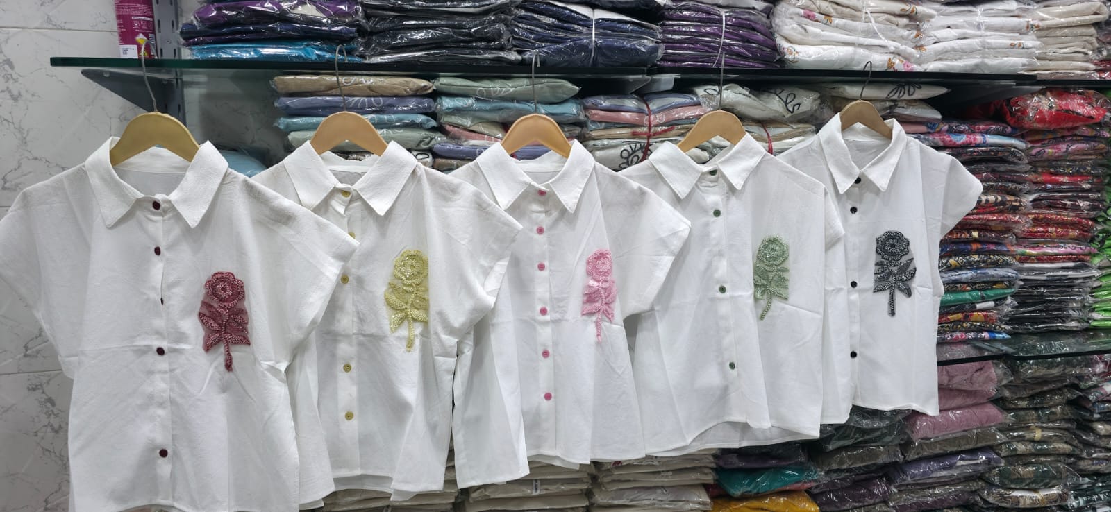 Flower Patch Rose Crop Shirt - All 5 Colours on Hangers in Store