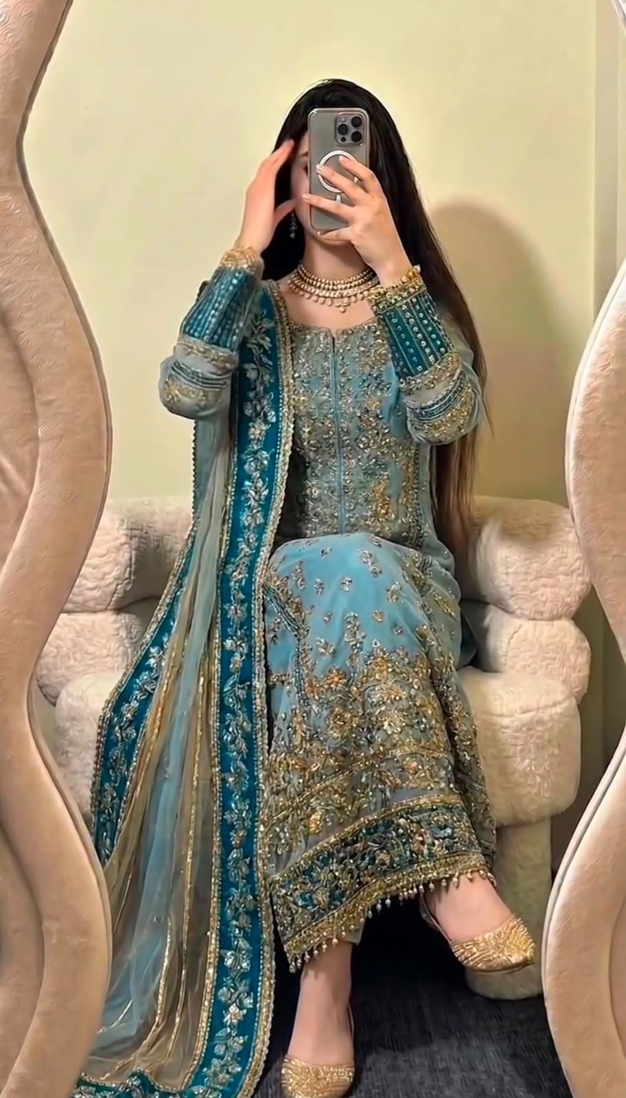 Dusty Rose Fox Georgette Embroidered Salwar Suit - Model Seated Outdoor